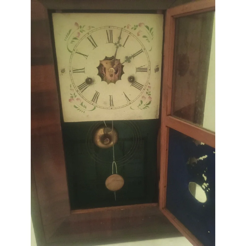 antique wall clock working